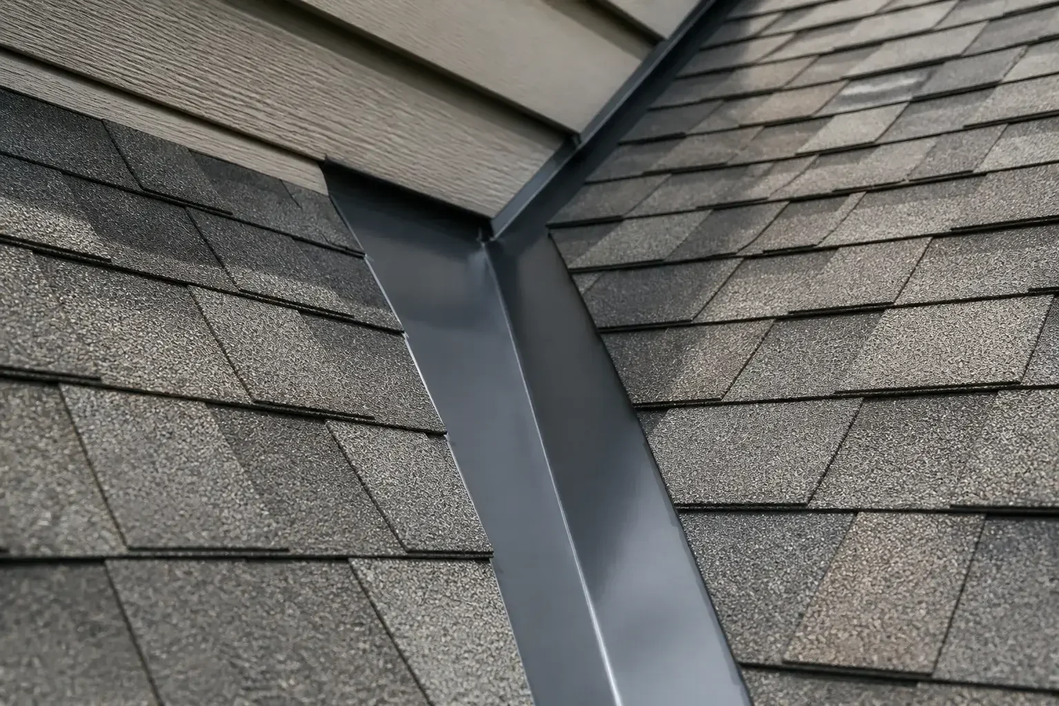 Roof valley leak repair with new flashing
